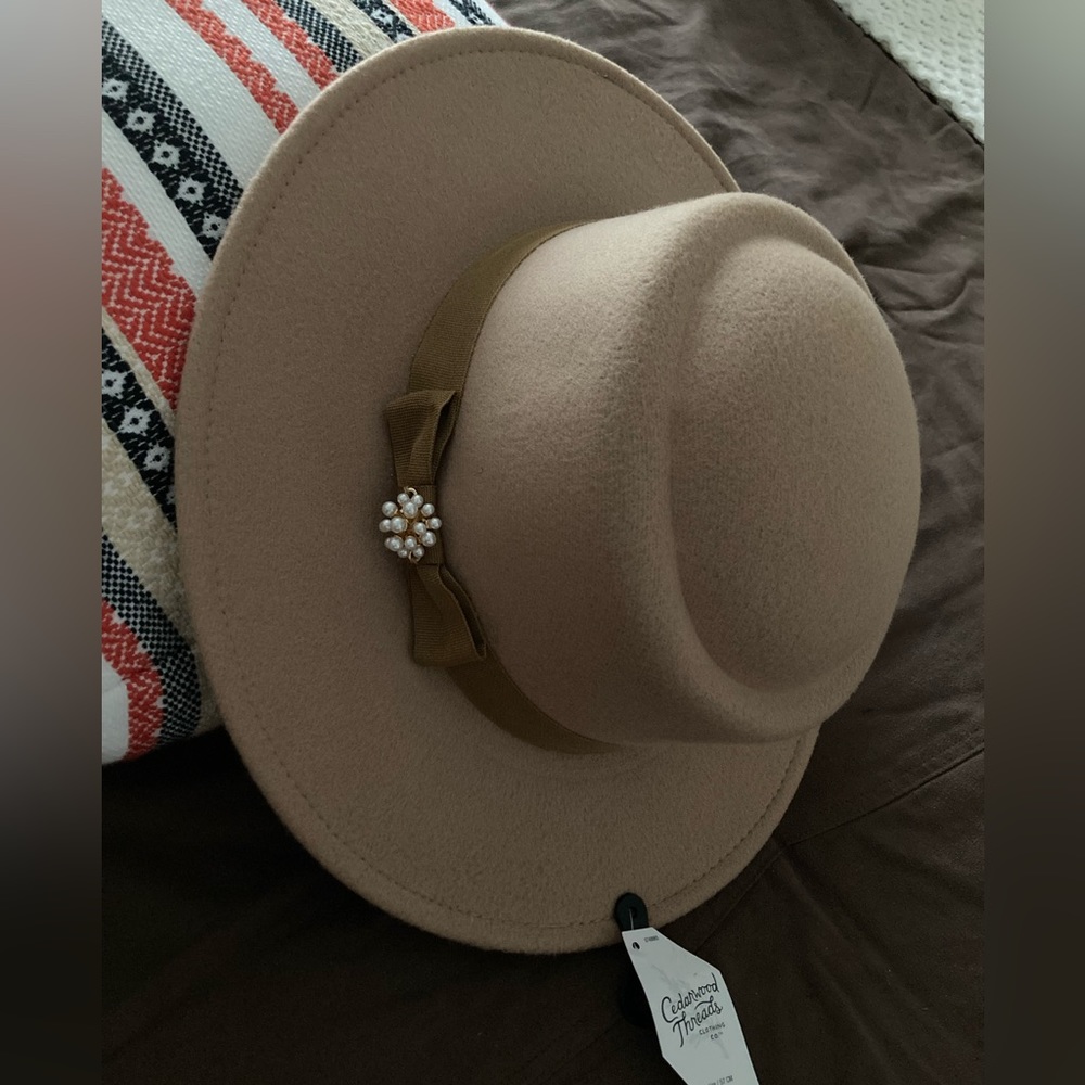 Stylish tan hat.
